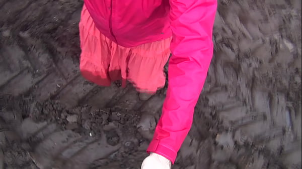 Brokenbitch filling the soles of her rubberboots with mud
