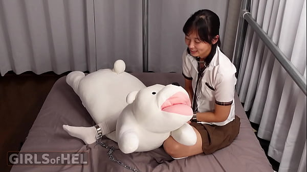 Chained up cutie makes herself cum with toys