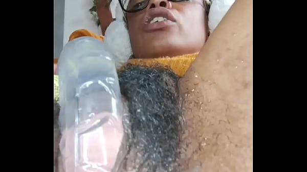 Hairy little bitch jumping on the dildo and squirting out of her pussy